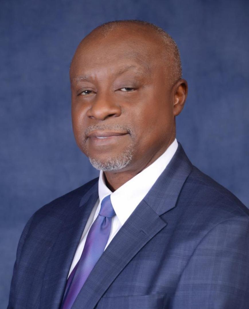 Dr. Charles Akpabio